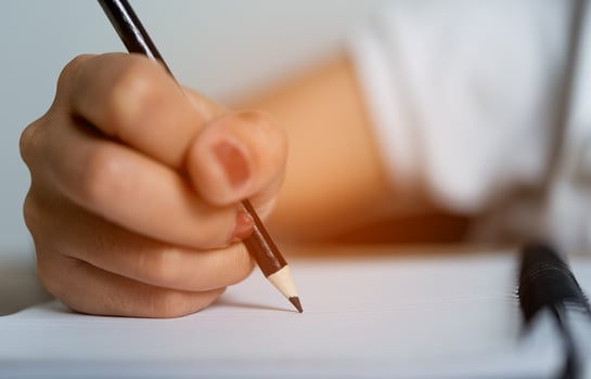 Hand and pencil pictures of students writing Education concept With copy space photo