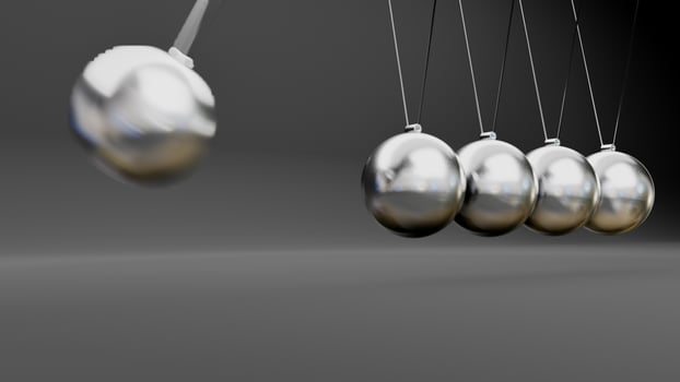 Newton cradle with balancing pendulum of silver metal balls . 3d render photo