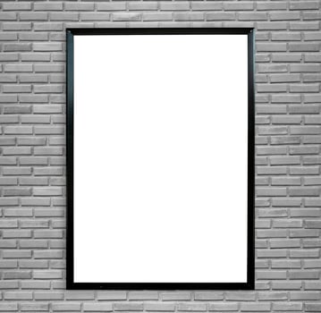 blank poster photo frame on vintage brick wall