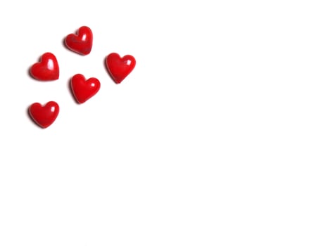ceramic hearts on white background photo