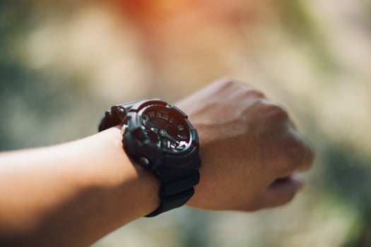 Hand and wrist watch Of men who have love in dressing style Time telling concepts photo