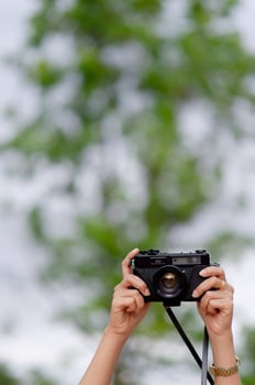 Woman and camera Female photographers are shooting happily. Travel concept photo