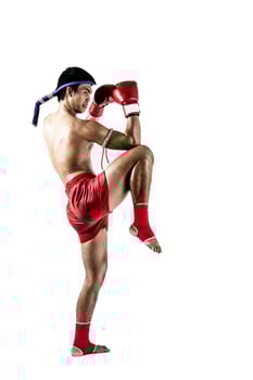 Muay thai, Asian man exercising thai boxing isolated on white background photo