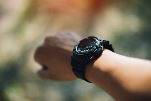 Hand and wrist watch Of men who have love in dressing style Time telling concepts photo
