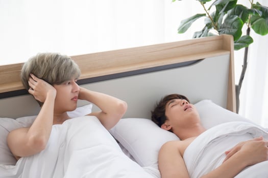 Asian gay couple teen snoring, trouble sleeping. photo