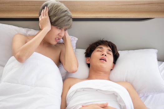 Asian gay couple, teen snoring, trouble sleeping photo