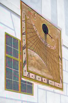 Cesky Krumlov, Southern Bohemian Region, Czech Republic, 2017. Sundial on the Wall of the State Castle and Chateau Complex photo