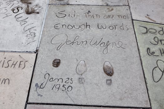 HOLLYWOOD, CALIFORNIA, 2011. John Wayne footprints and signature photo