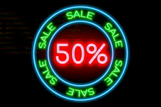 Sale 50 percent neon banner, light signboard. photo