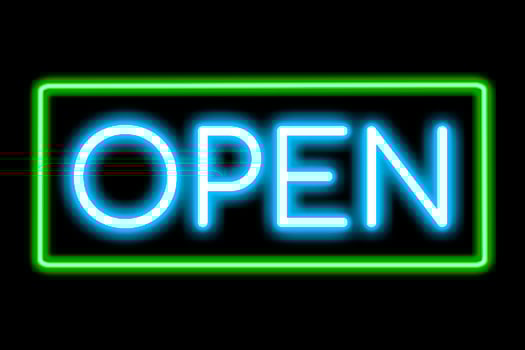 Open neon banner, light signboard. photo