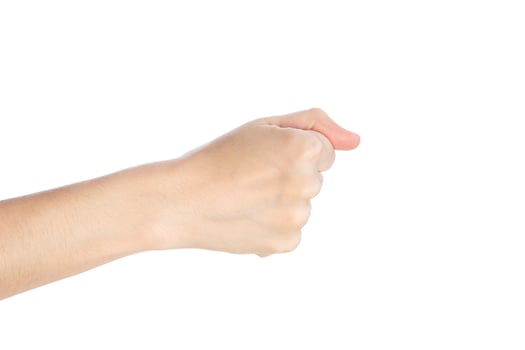 Woman hand show fist gesture isolated on a white background photo