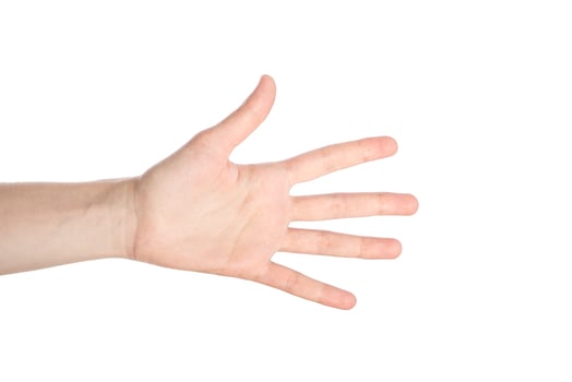 Woman hand shows numder five gesture isolated on a white background photo