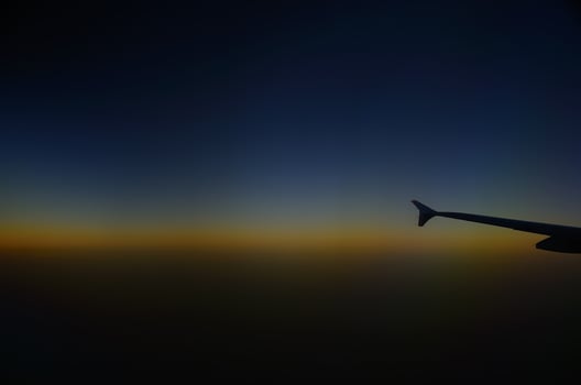 sundown airplane flight photo