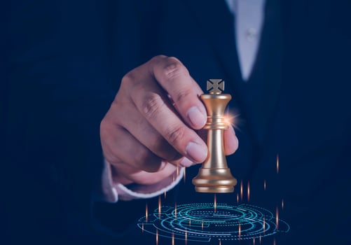 Businessman holding and throwing golden king chess to target for business winner with successfully in the competition with technology network background. Management and leadership strategy concept. photo