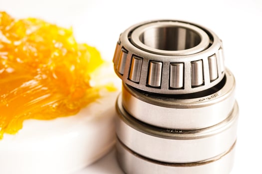 Grease and ball bearing, lithium machinery lubrication for automotive and industrial. photo