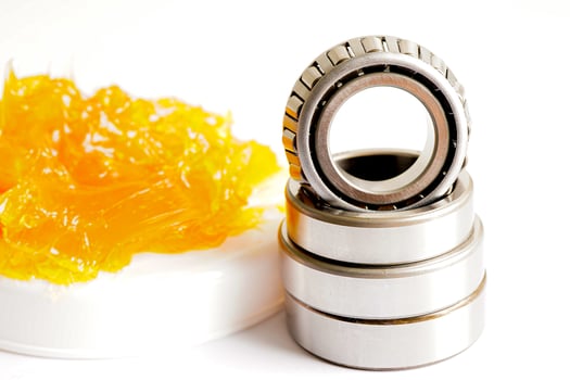 Grease and ball bearing, lithium machinery lubrication for automotive and industrial. photo
