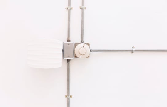 Smoke detectors on the ceiling of the office building photo