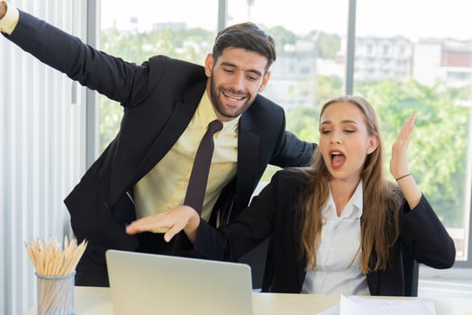 A new generation of business people who work at an office together with documents on the desk with smiles and happiness photo