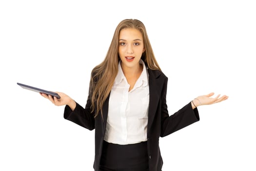Beautiful young business woman standing on a tablet isolated on white background, photo