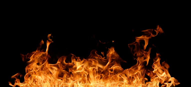 Fire flames on black background. photo