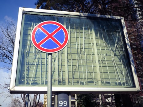 Red and blue regulation sign in the street. photo