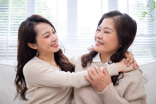 Image of Asian mother and daughter at home photo
