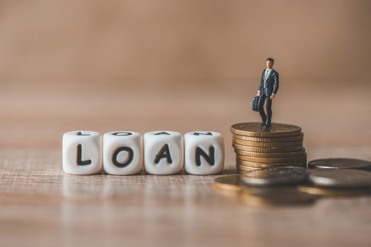 Financial loan concept,  businessmen stand on money coin, loan money. loan officer photo