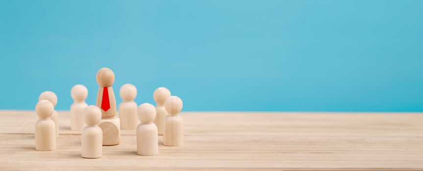 Successful businessman standing out from the crowd. Concept is the  leadership and team victory in business. photo