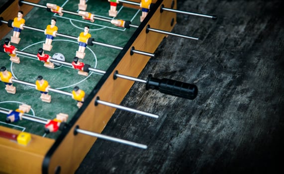 focus ball in start soccer table game. Boy toy sport game concept. photo