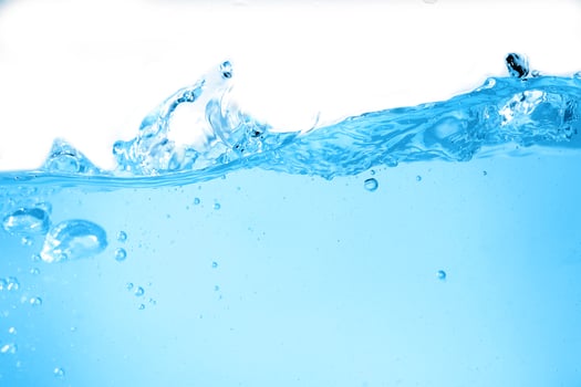 Blue surface water and air bubble isolated on white background photo