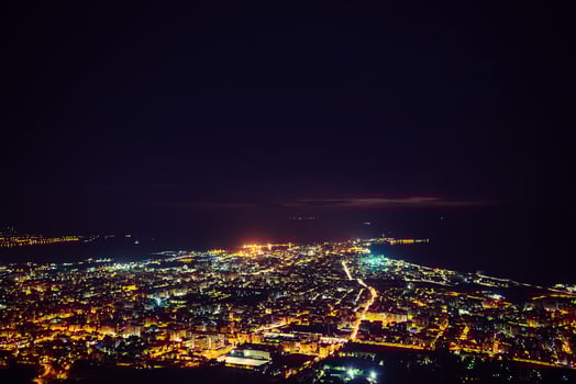city with a night on the beach photo