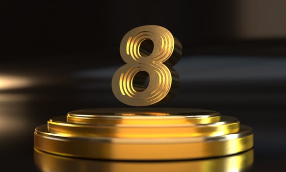 Numbers above golden triple pedestal photo