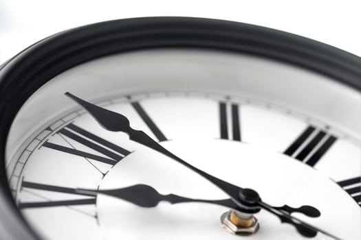 Macro view of hands of wall clock. photo