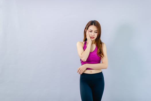 Women showing toothache From tooth decay Mouth health concept photo
