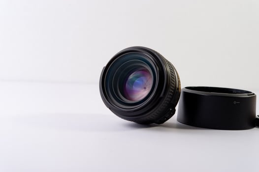 camera lens with reflector beautiful placed on a white background photo