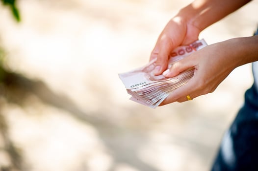 Close-up photos and bank cards used for business and currency exchange purchases. Hand and money concept