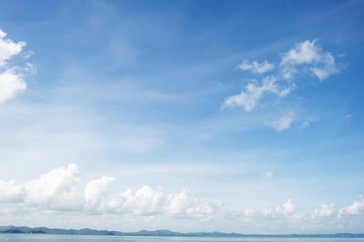 The sea and the blue sky, clean white sky, beautiful in nature photo