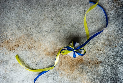 Blue and yellow ribbons in Ukrainian flag colors photo