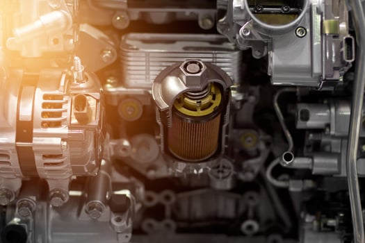 Car engine part, concept of modern vehicle motor and cut metal car engine part details photo