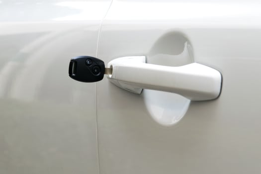 open car door with key photo