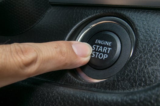 Car driver starting the engine photo