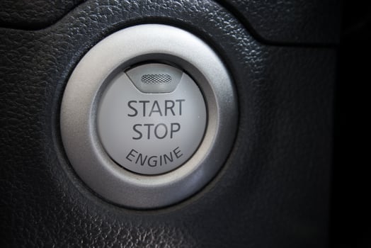 Engine start stop button from a modern car interior photo