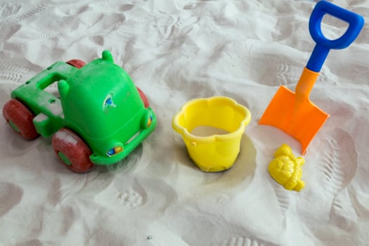 Toy Bulldozer on Sand photo