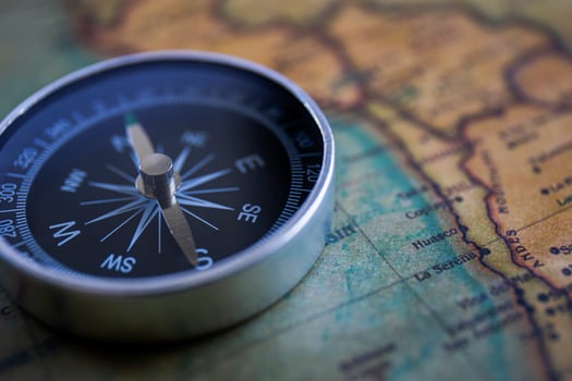 Compass on the background, old world map, vintage style, geo-navigation concept. photo