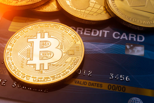 Close Up Gold bitcoin on credit card Concept background. photo