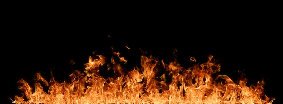 Fire flames on black background. photo