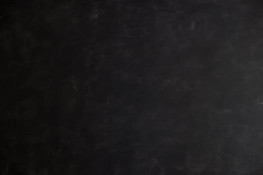 Chalk rubbed out on blackboard photo