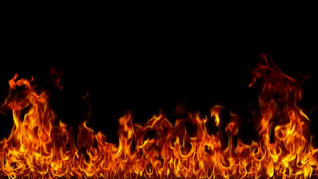 Fire flames on black background. photo