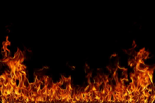 Fire flames on black background. photo
