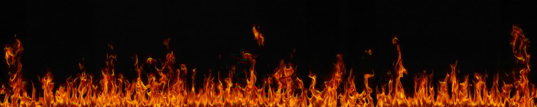 Fire flames on black background photo